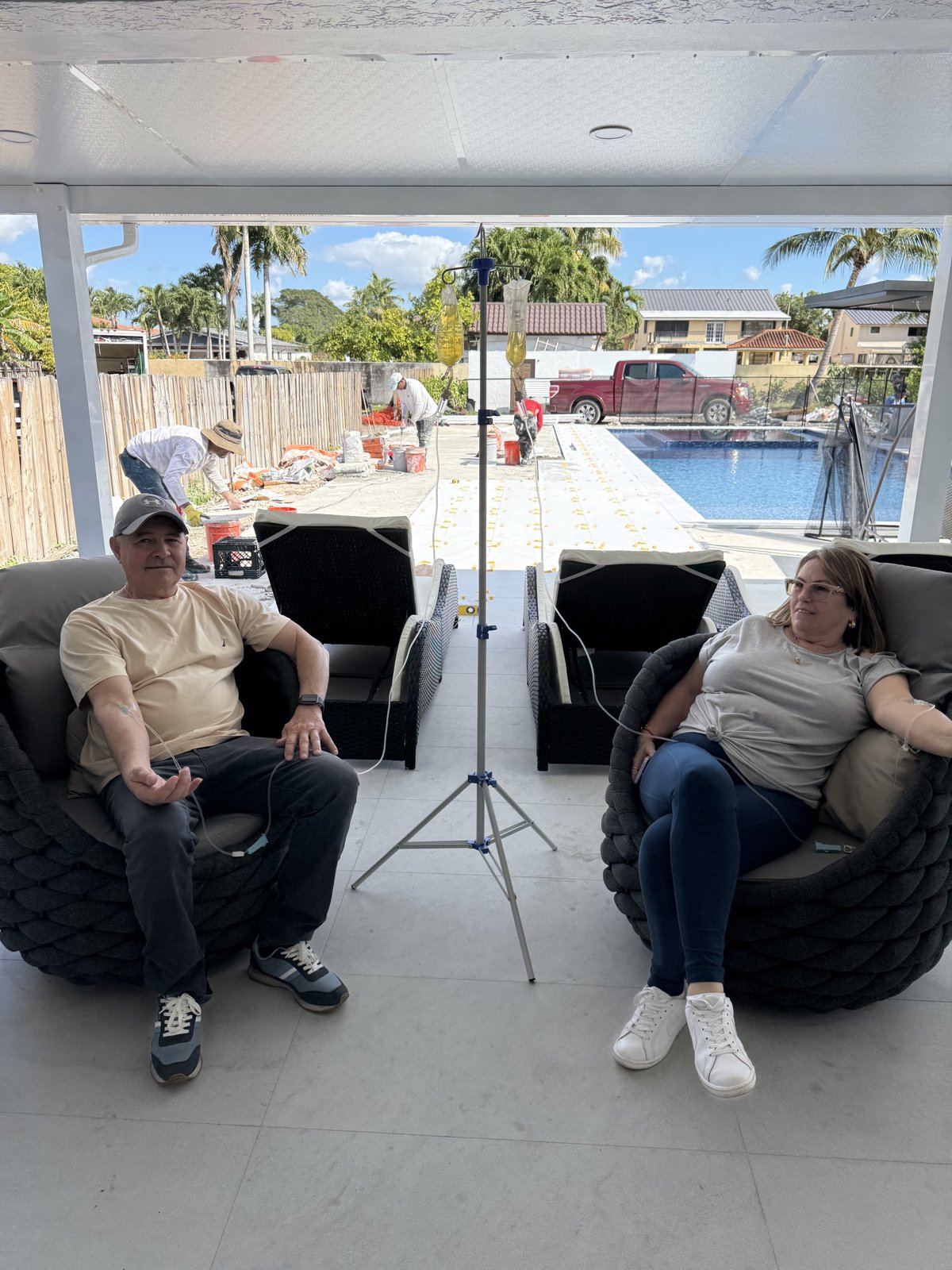 IV therapy session with a Miami skyline view
